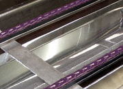 Trackstar UHMW Belt Guides with Tango Conveyor Belting on a Tile Conveyor